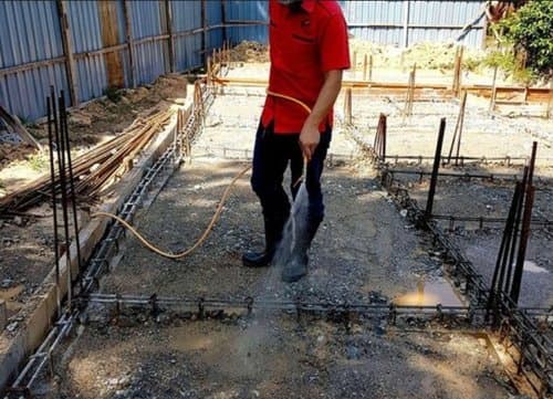 Pre-construction anti-termite soil and foundation treatment