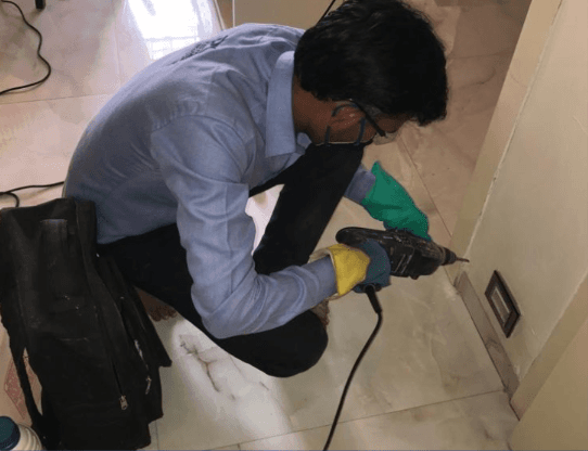 Post-construction anti-termite treatment—inspection, drilling, and barrier protection